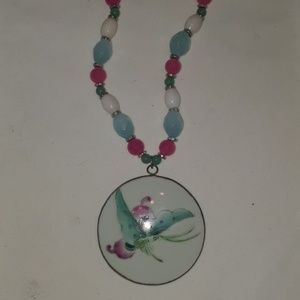 Handmade beaded necklace with porcelain pendant